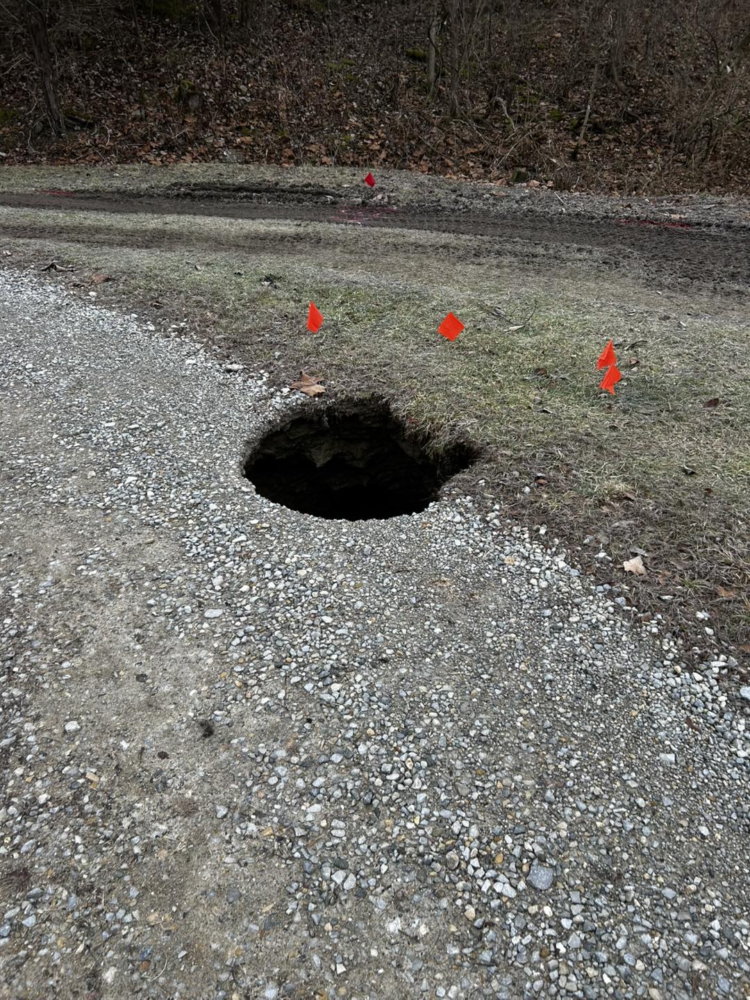 Sinkhole damage in Aurora Indiana driveway